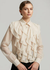 woman-wearing-cream-ruffle-blouse